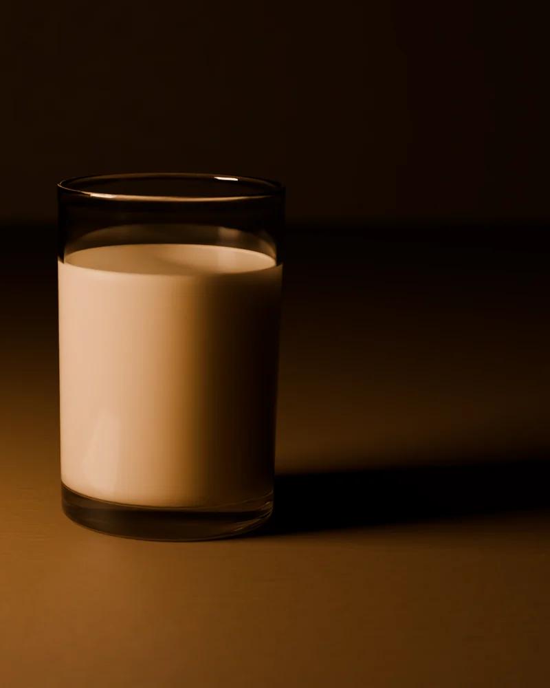 A glass of MEAL in midday light.