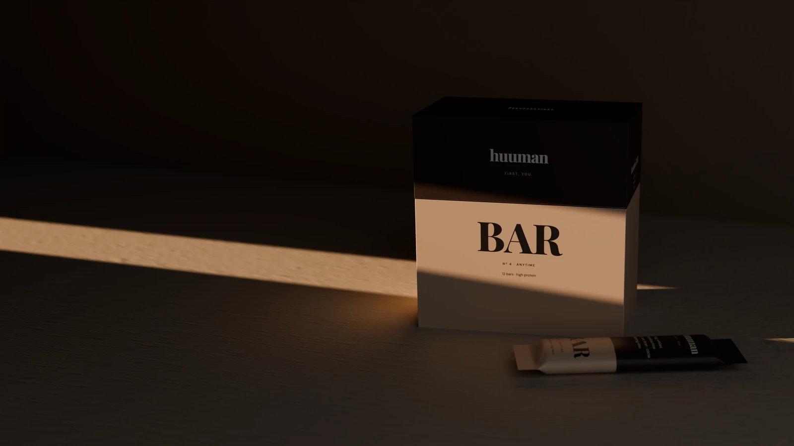 The BAR box in a blade of low light, one bar lying in front of it.