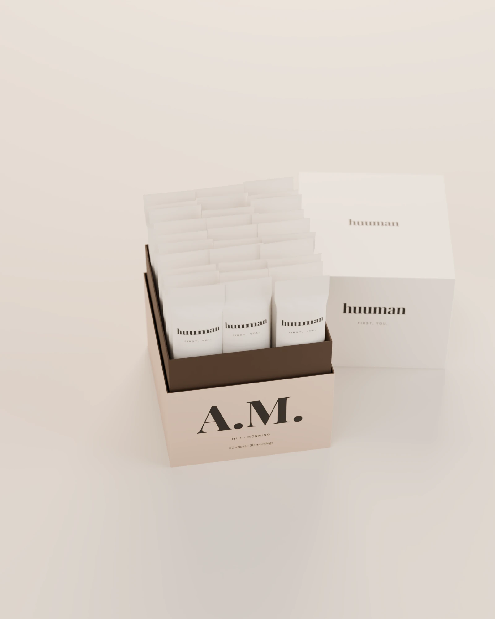 The A.M. box open: thirty sticks standing in three rows behind a walnut collar, the lid set down beside it.