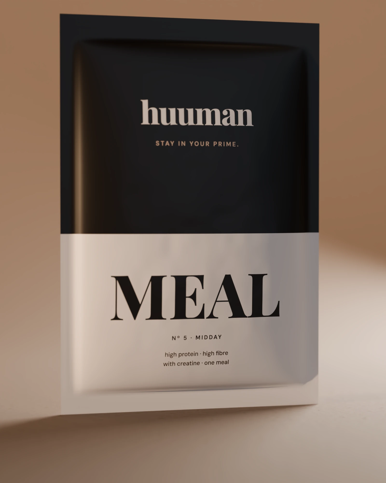 A single MEAL sachet: espresso above with huuman, a cream band below with MEAL.
